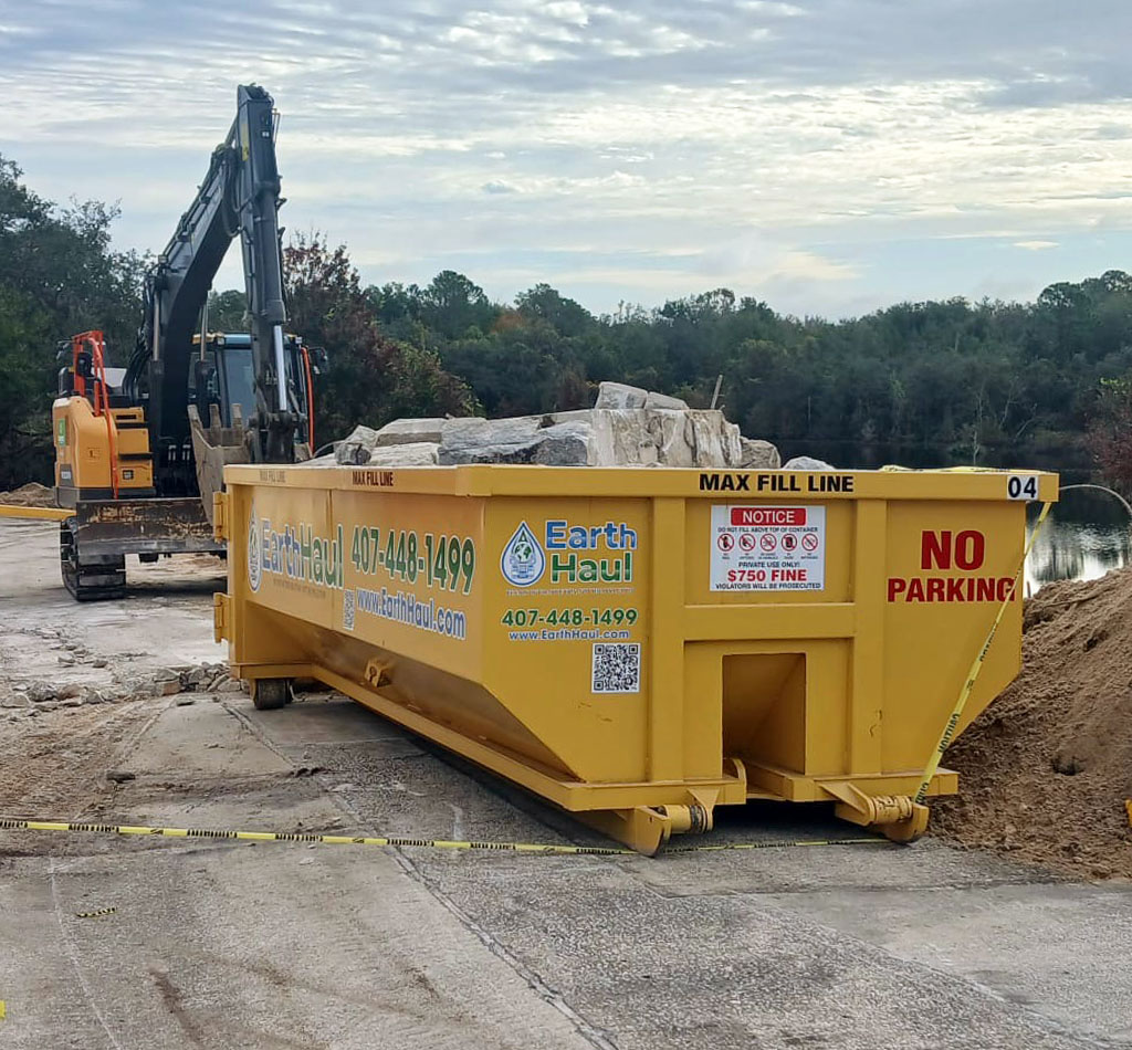 Concrete disposal roll-off dumpsters in Satellite Beach, FL.