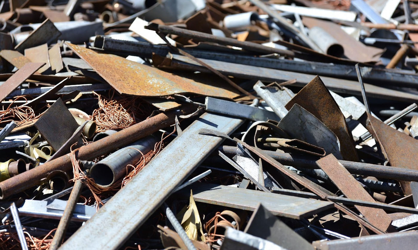 EarthHaul dumpster filled with scrap metal in Bartow, FL.